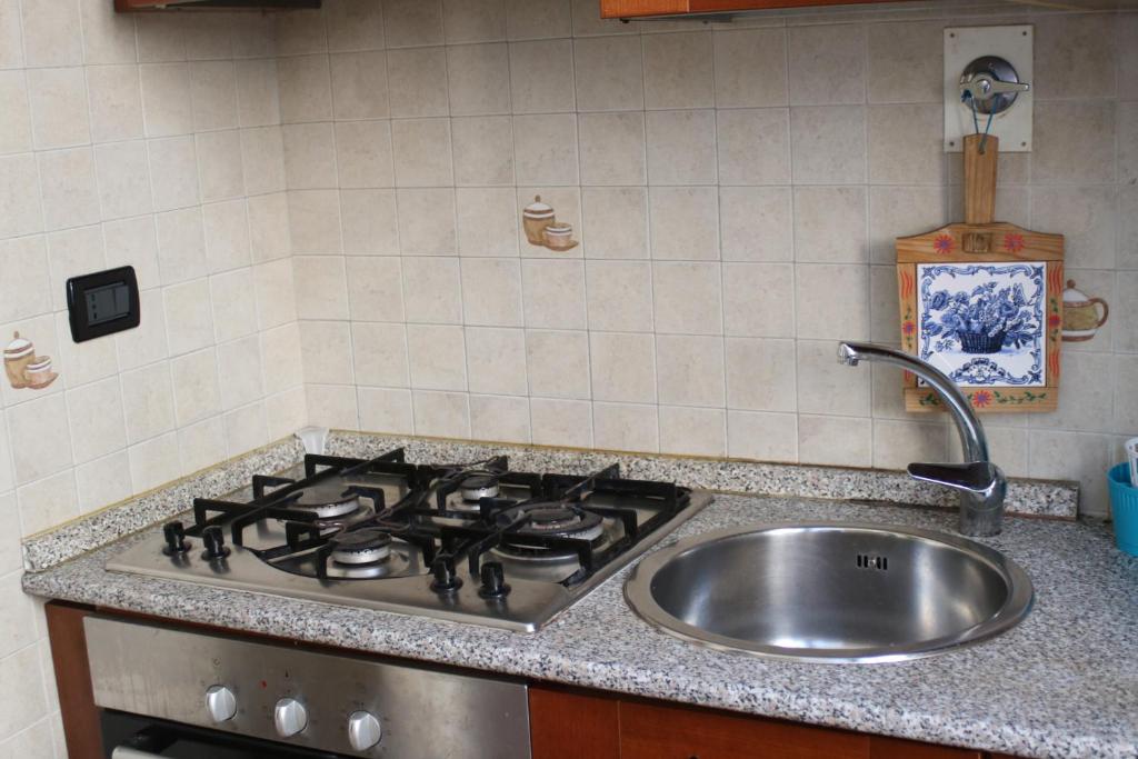 Kuchyň nebo kuchyňský kout v ubytování B&B Palazzo de "Il Nuovo Duca Minimo"