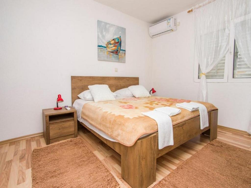 Postel nebo postele na pokoji v ubytování Apartment PASCAL