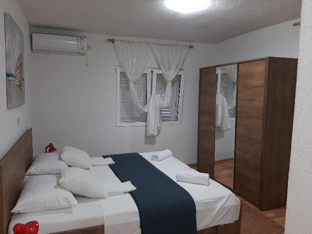 Postel nebo postele na pokoji v ubytování Apartment PASCAL
