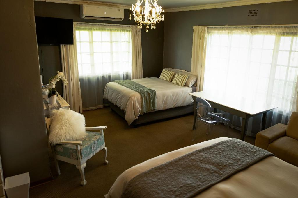 Letto o letti in una camera di Marculem Guest Farm