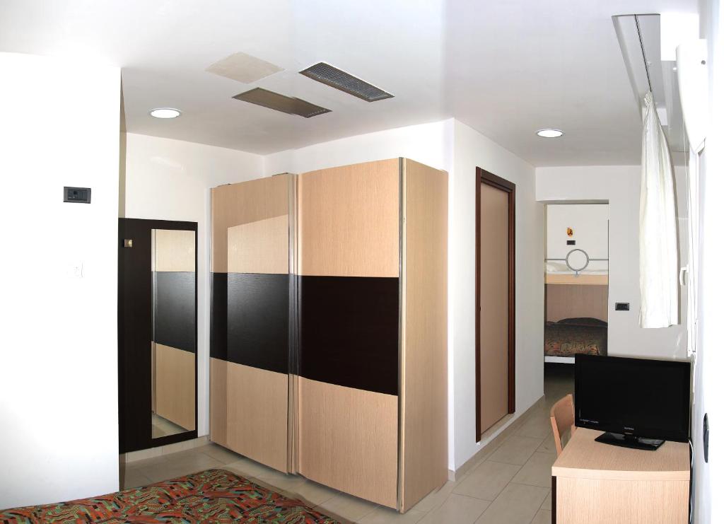 Kuchyň nebo kuchyňský kout v ubytování Hotel Alba D'Oro