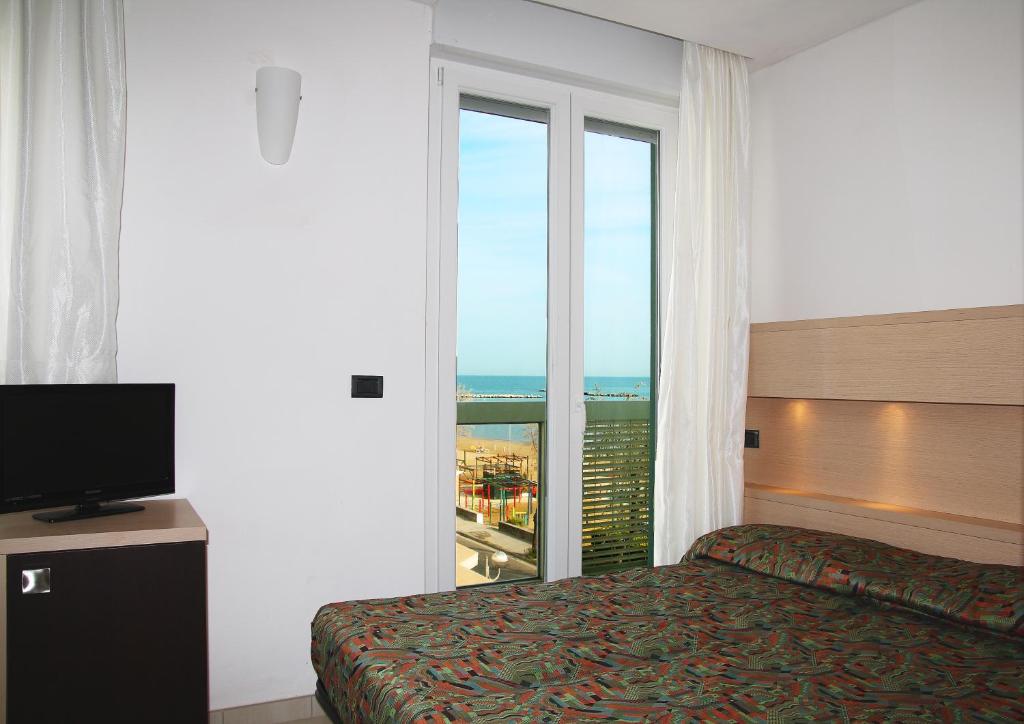 TV a/nebo společenská místnost v ubytování Hotel Alba D'Oro