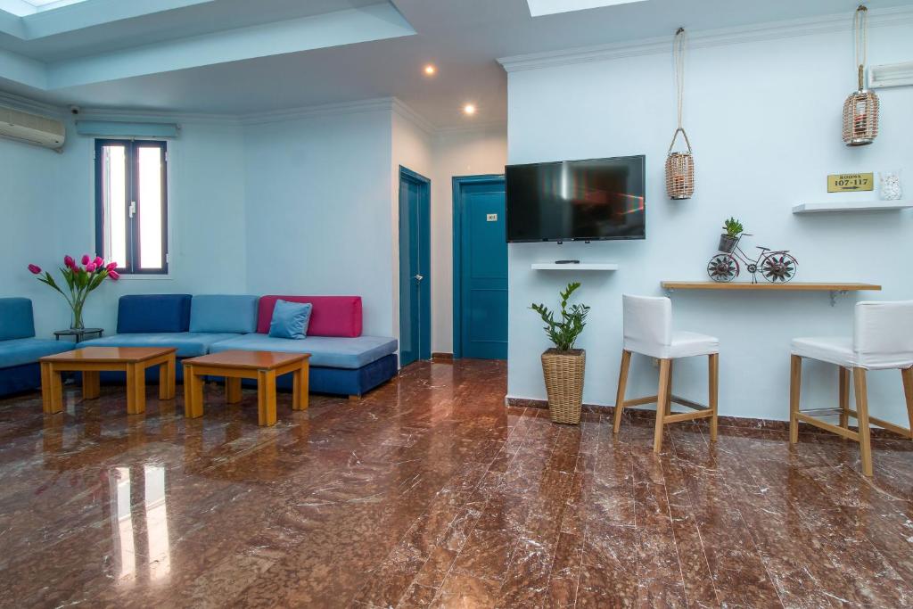 TV a/nebo společenská místnost v ubytování Kahlua Hotel Apartments