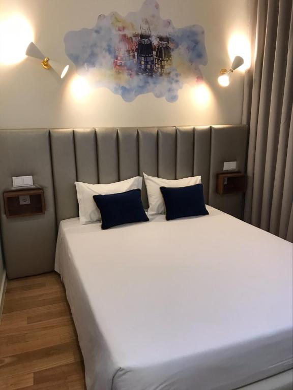 Postel nebo postele na pokoji v ubytování Guest House