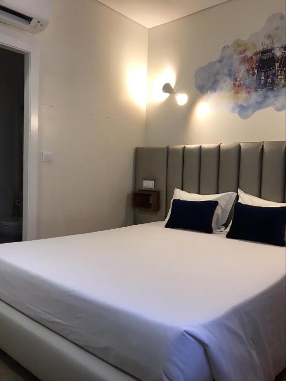 Postel nebo postele na pokoji v ubytování Guest House