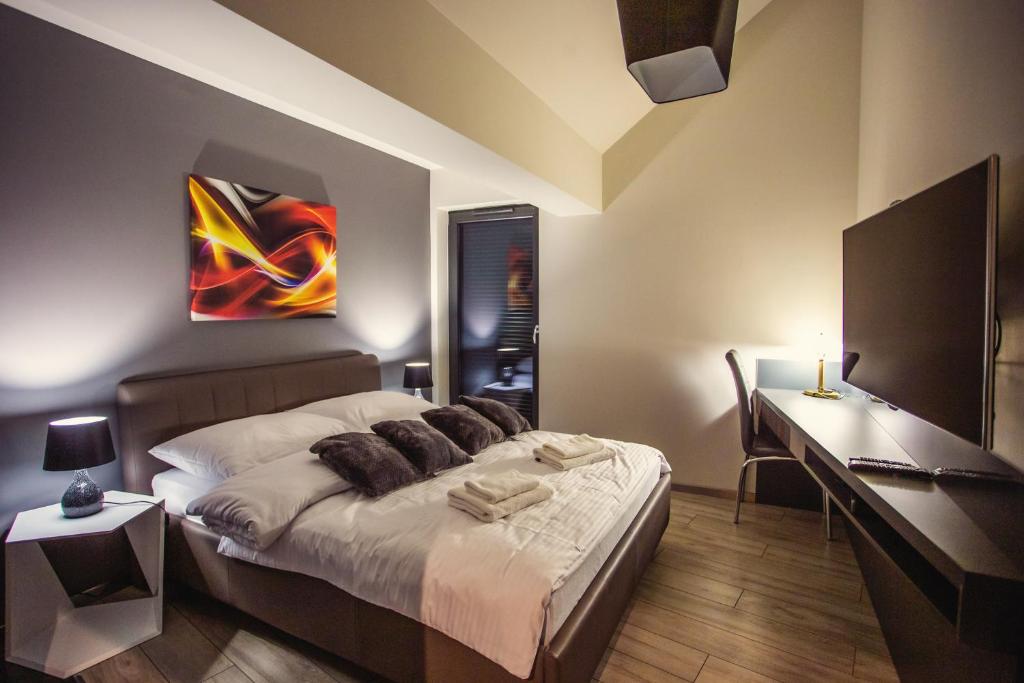Posteľ alebo postele v izbe v ubytovaní Apartament LUX Ustroń