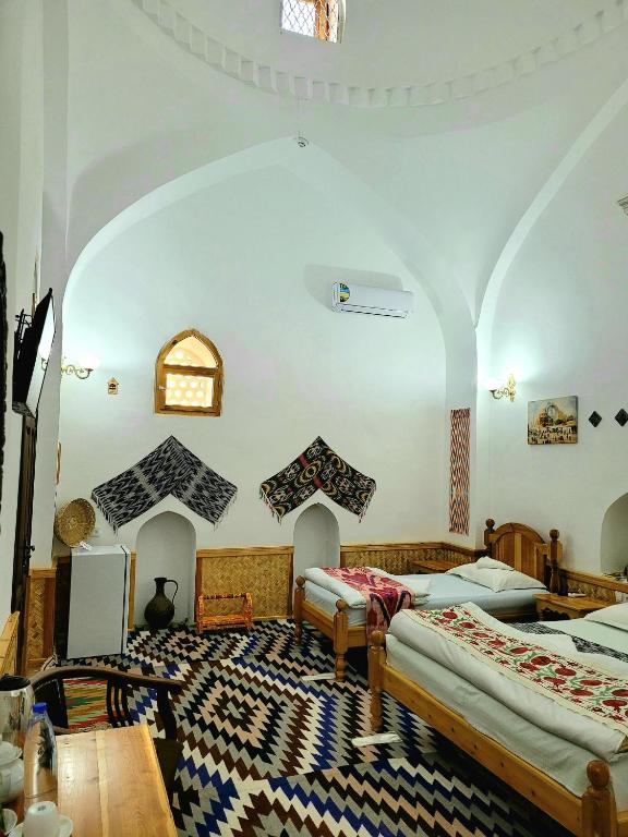 madrasah Polvon-Qori boutique hotel XIX century - Habitación Familiar De Lujo