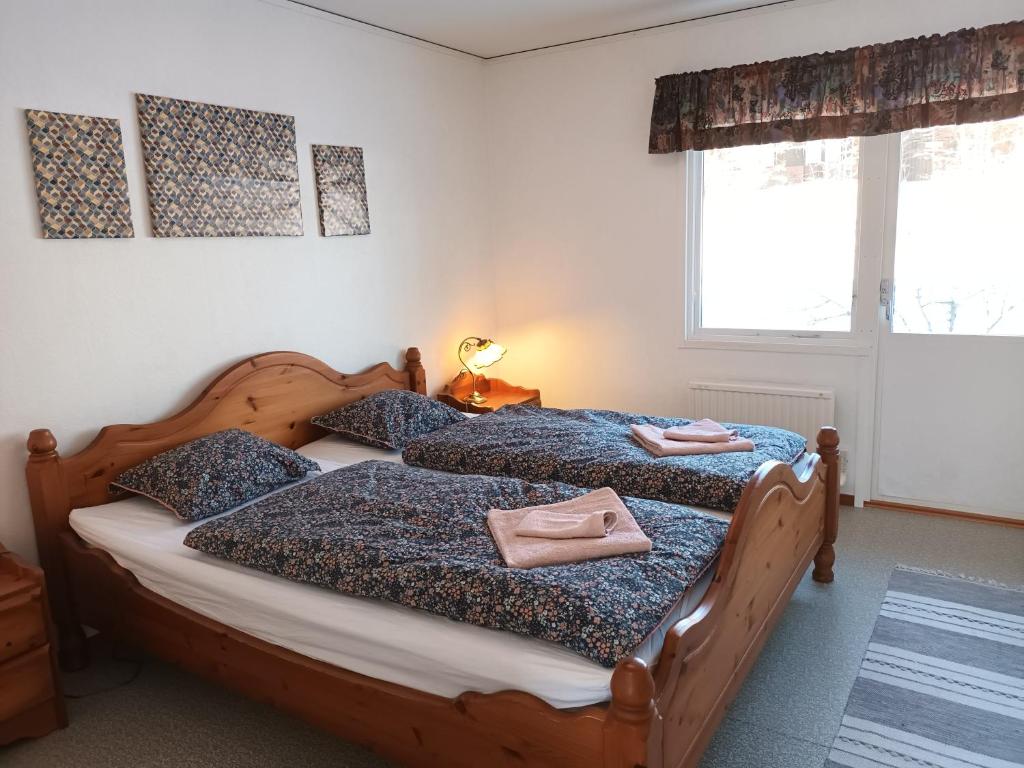Postel nebo postele na pokoji v ubytování Dals Långeds B&B