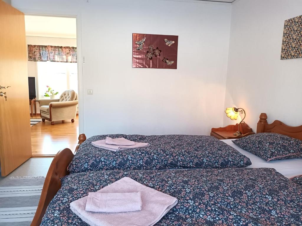 Postel nebo postele na pokoji v ubytování Dals Långeds B&B