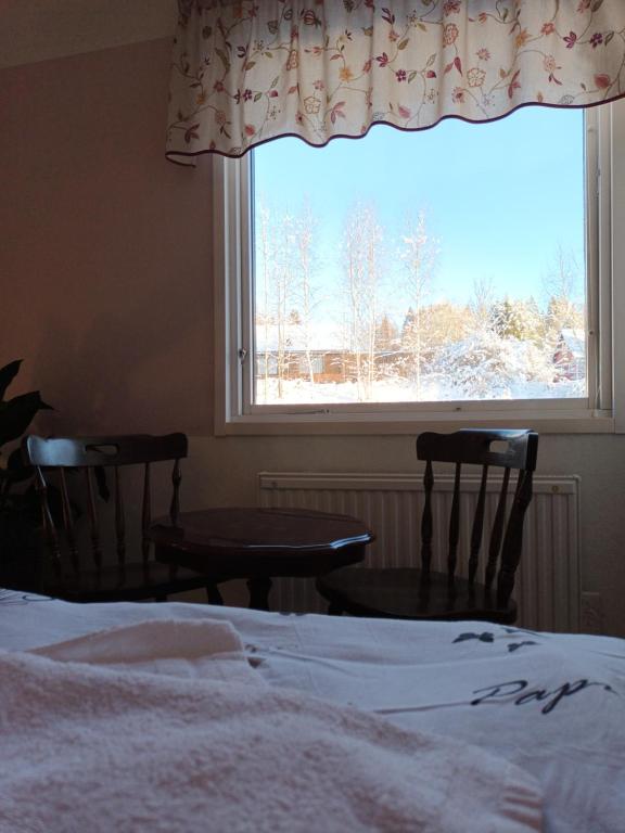 Postel nebo postele na pokoji v ubytování Dals Långeds B&B