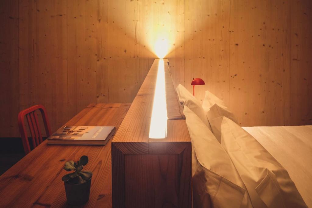 Postel nebo postele na pokoji v ubytování FeelViana Sport Hotel