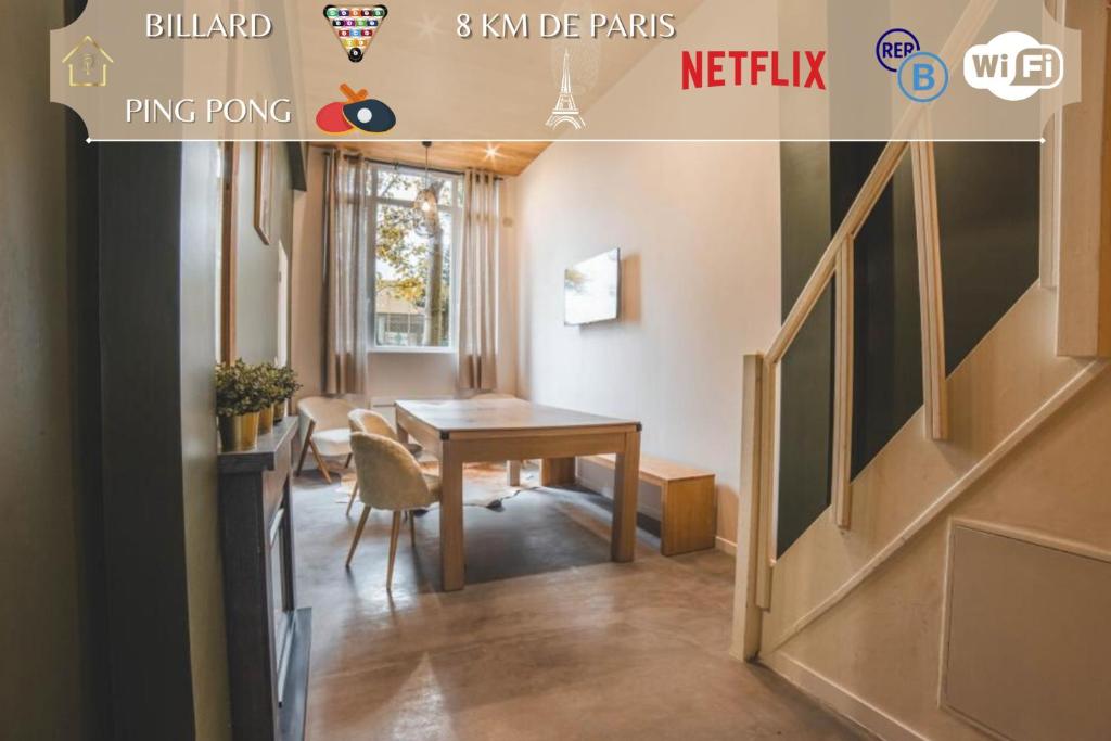 une petite salle à manger avec une table et un escalier dans l'établissement Design & Original - Appart'Hôtel Mont Blanc, à Cachan