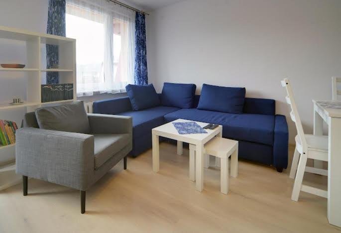 Posedenie v ubytovaní Trevilles Apartamenty - Granatowy