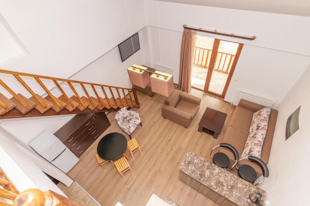 Televisyen dan/atau pusat hiburan di Gudauri Palace apartments in New Gudauri
