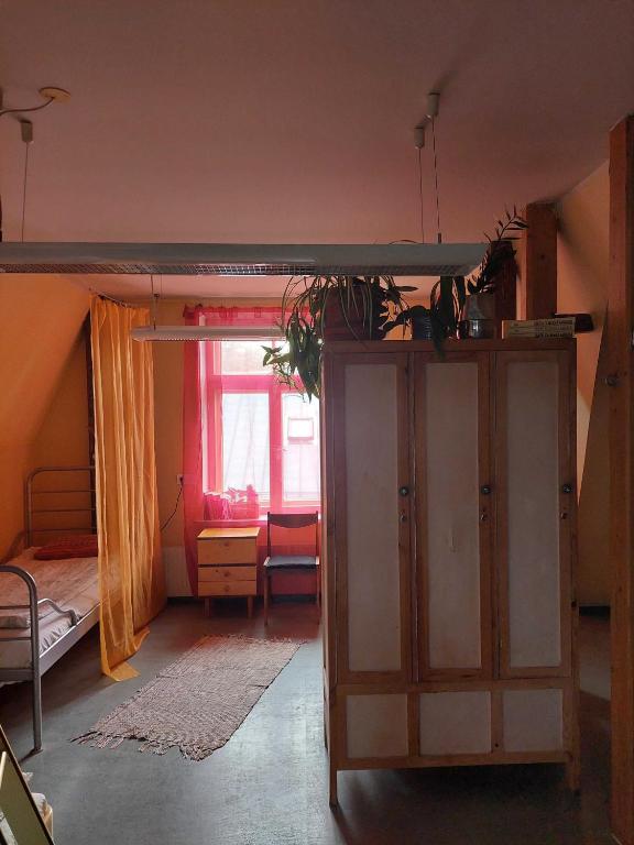 Voodi või voodid majutusasutuse Looming Hostel toas