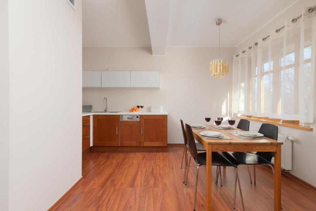 Kuchyňa alebo kuchynka v ubytovaní Kaszelewskiego Apartment Zakopane by Noclegi Renters