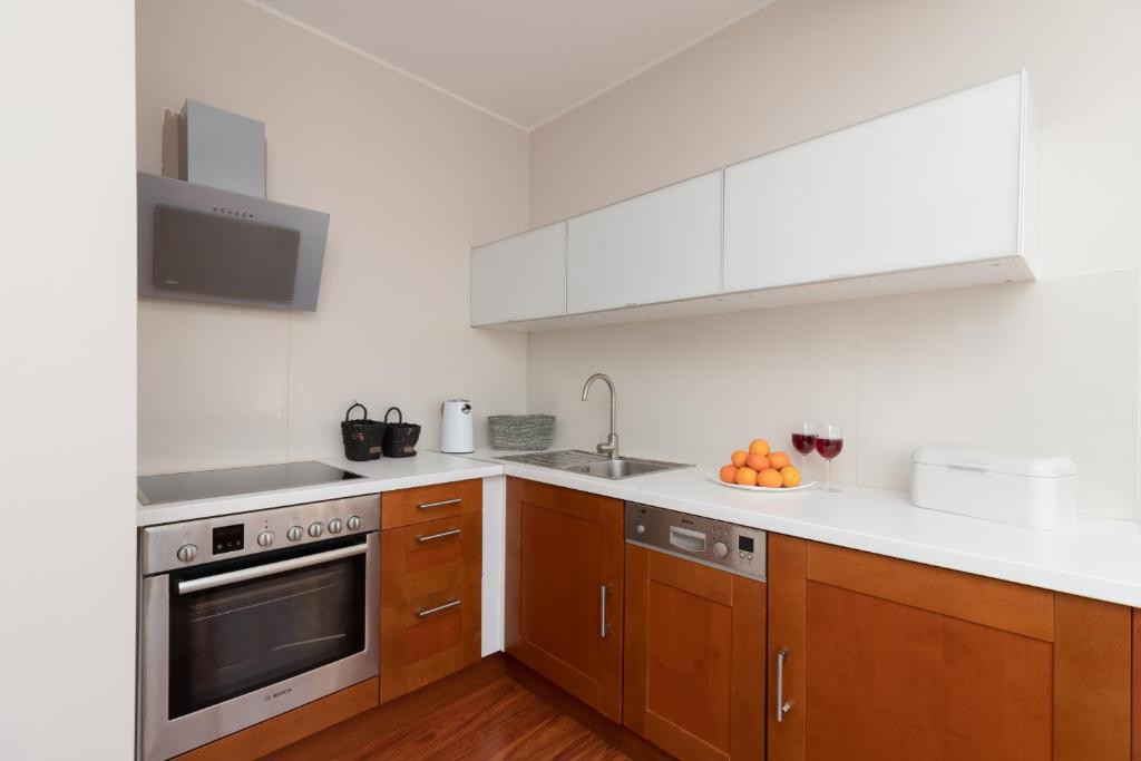 Kuchyňa alebo kuchynka v ubytovaní Kaszelewskiego Apartment Zakopane by Noclegi Renters