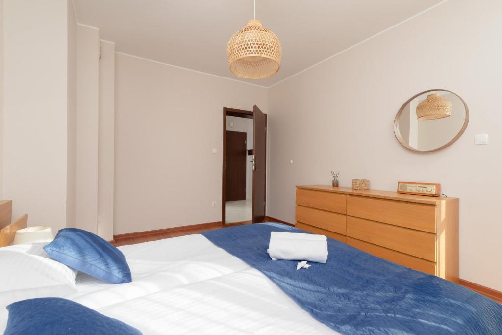 Posteľ alebo postele v izbe v ubytovaní Kaszelewskiego Apartment Zakopane by Noclegi Renters