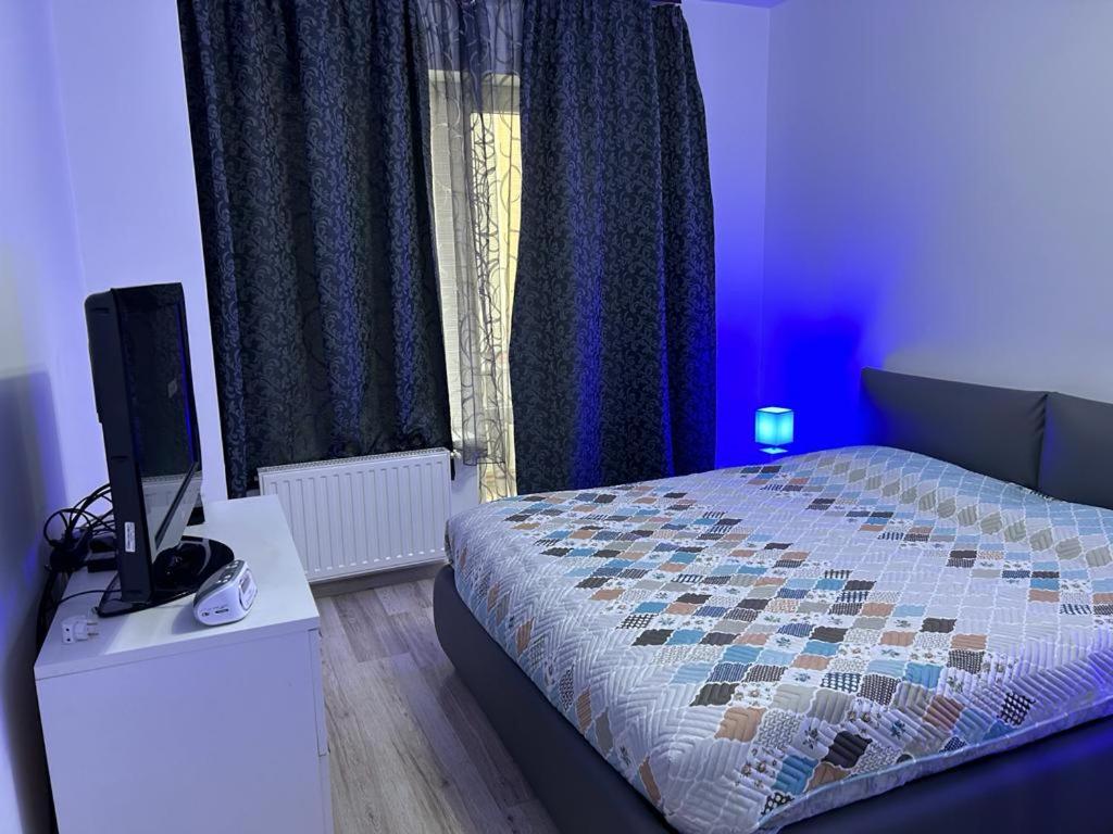 Postel nebo postele na pokoji v ubytování B&B Iulius