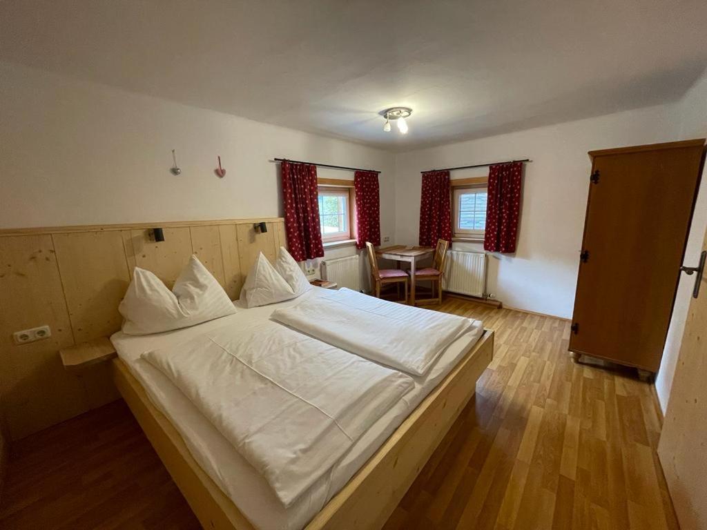 Postel nebo postele na pokoji v ubytování Müllnerhof