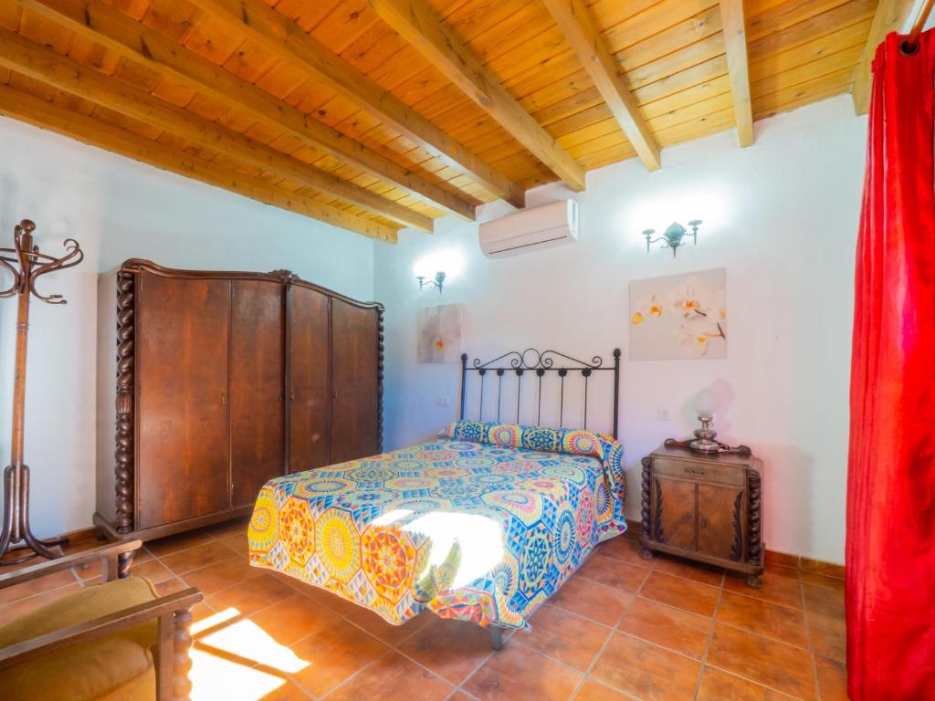 A bed or beds in a room at Cubo's Finca La Curva