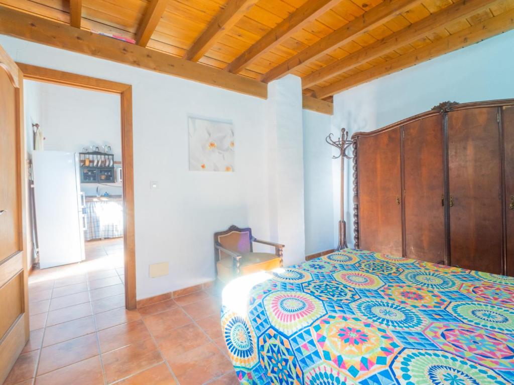 A bed or beds in a room at Cubo's Finca La Curva