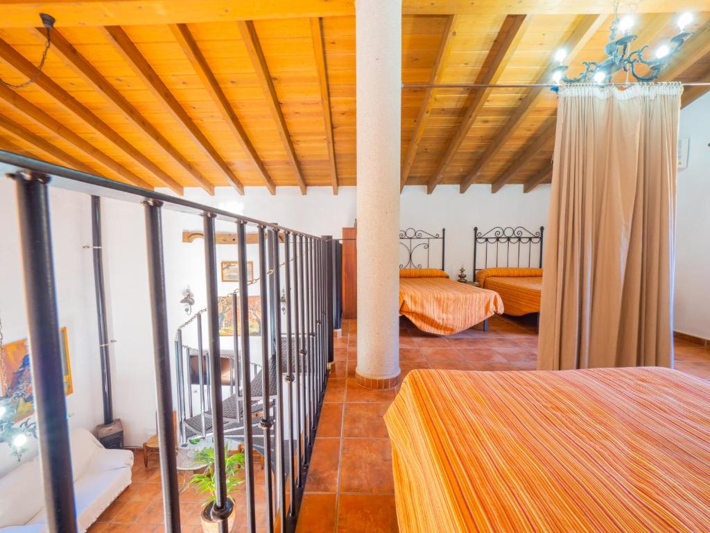 A bed or beds in a room at Cubo's Finca La Curva