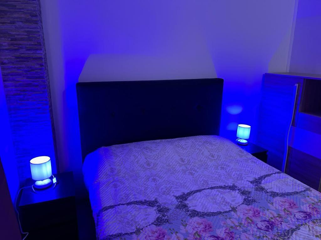 Postel nebo postele na pokoji v ubytování B&B Iulius