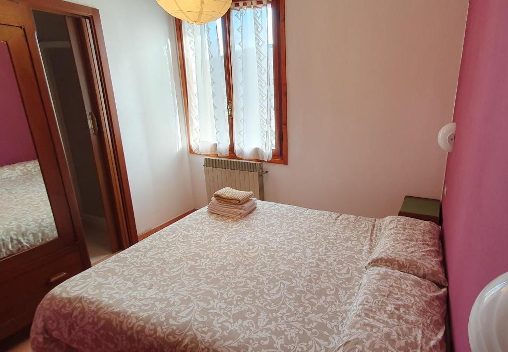 Postel nebo postele na pokoji v ubytování La Buca delle Fate Ristorante Albergo