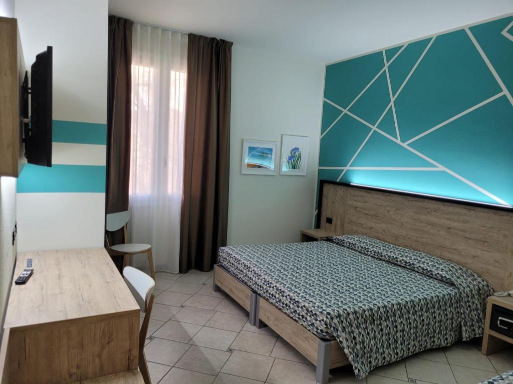 Postel nebo postele na pokoji v ubytování Maritan Hotel & Spa