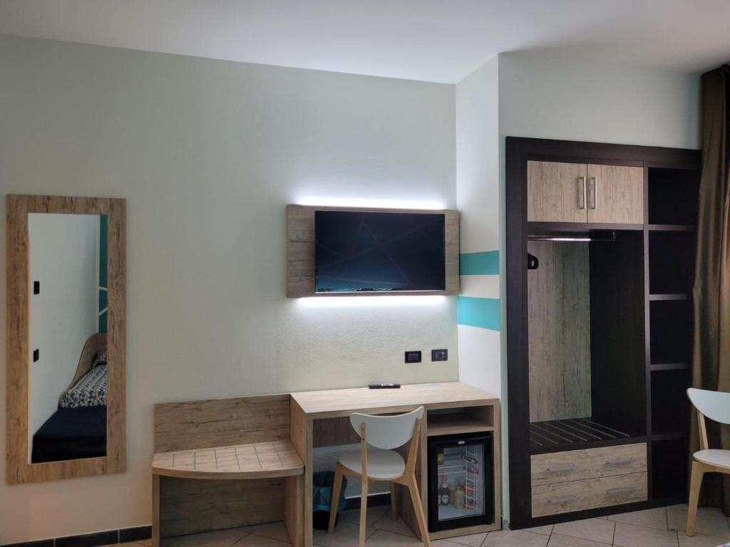 TV a/nebo společenská místnost v ubytování Maritan Hotel & Spa