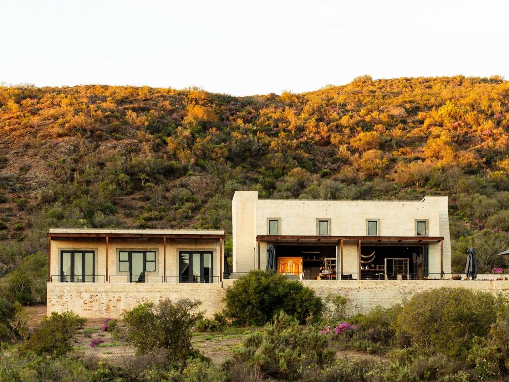 a house on the side of a mountain at Karoo 62 Escapes in Ladismith