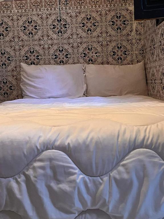 Postel nebo postele na pokoji v ubytování Riad TaTam House