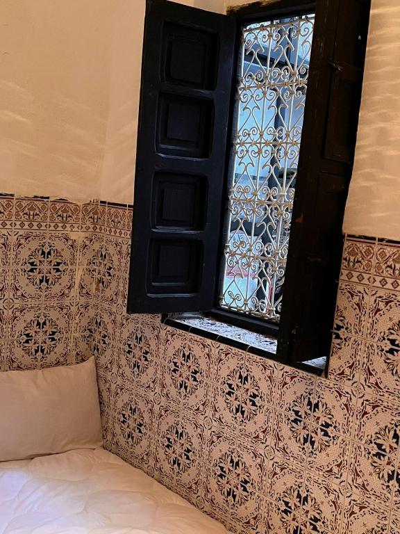 Postel nebo postele na pokoji v ubytování Riad TaTam House