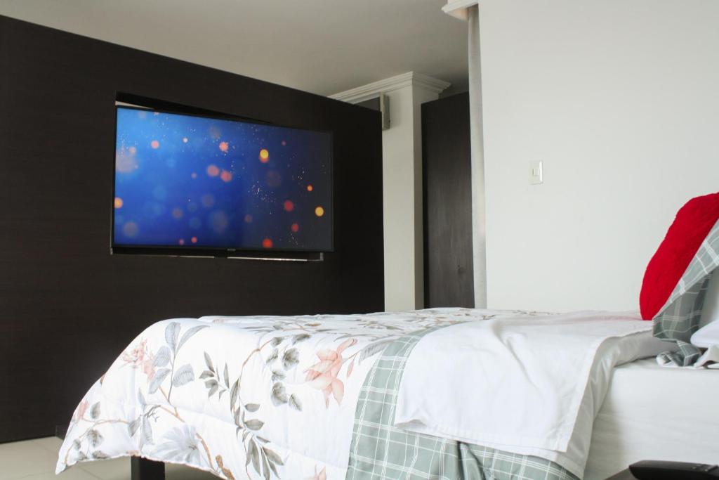 TV a/nebo společenská místnost v ubytování Apartahotel Kelly