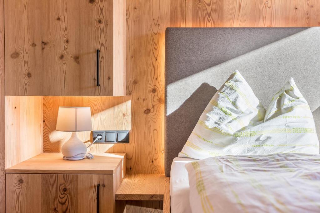 Postel nebo postele na pokoji v ubytování Guntschöllerhof Rotwand