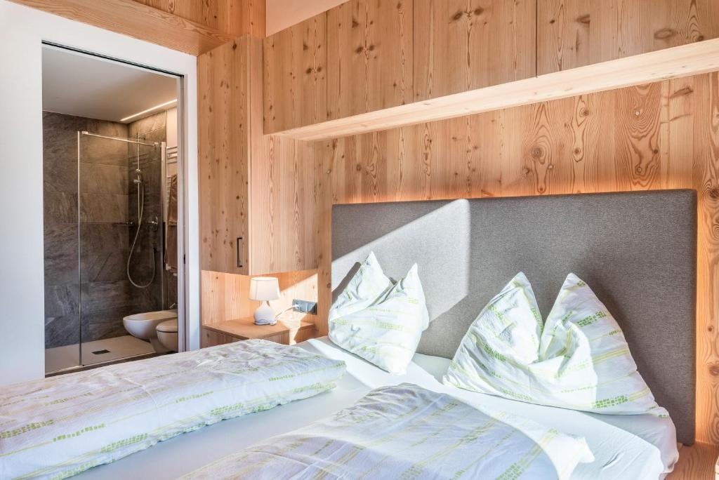 Postel nebo postele na pokoji v ubytování Guntschöllerhof Rotwand