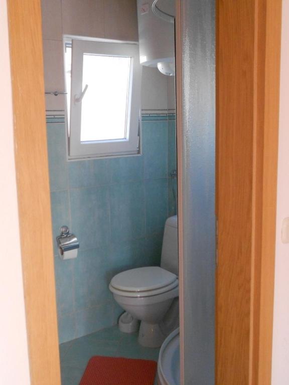 Kúpeľňa v ubytovaní Studio apartment in Privlaka with balcony, air conditioning, WiFi 878-2