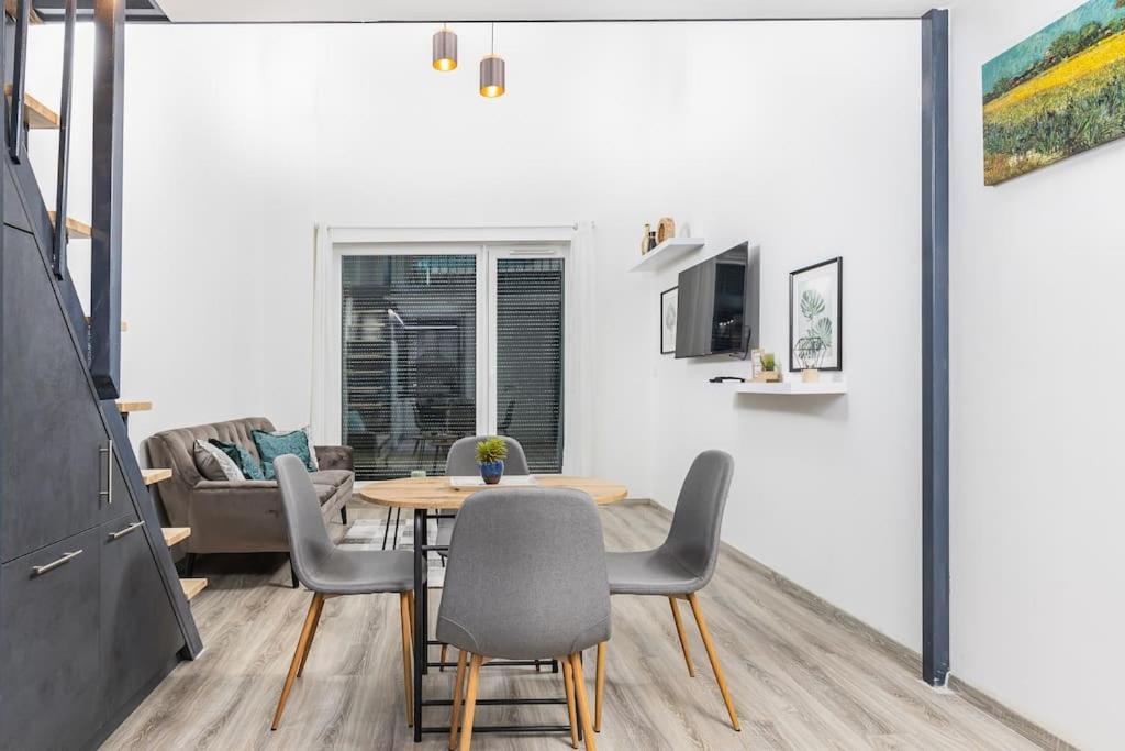 Televízia a/alebo spoločenská miestnosť v ubytovaní Venus Apartments - Westside residence