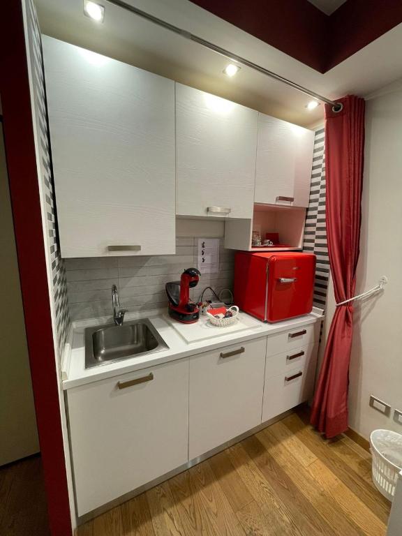 Kuchyň nebo kuchyňský kout v ubytování B&B La Fisarmonica