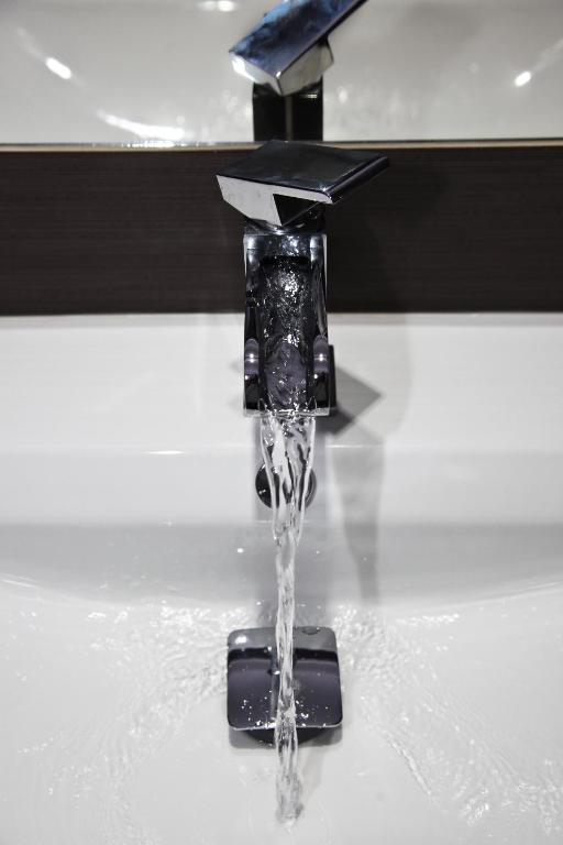 a stream of water coming out of a water fountain at Pension Dvořák in Karlovy Vary