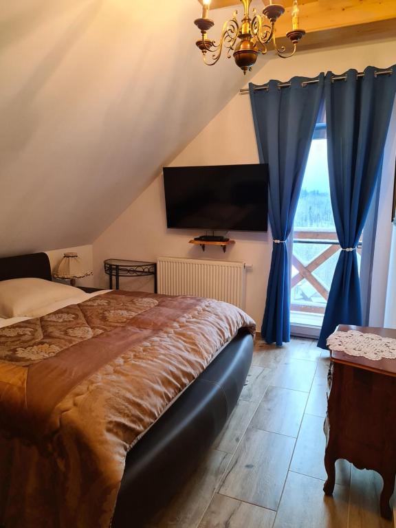 Posteľ alebo postele v izbe v ubytovaní Chata w Grapie