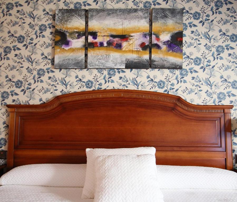 Postel nebo postele na pokoji v ubytování Hotel Conde Ansúrez By Almia Hoteles