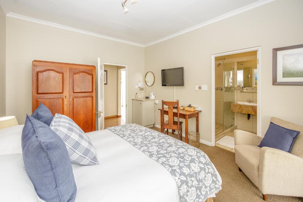 A bed or beds in a room at The Ashford