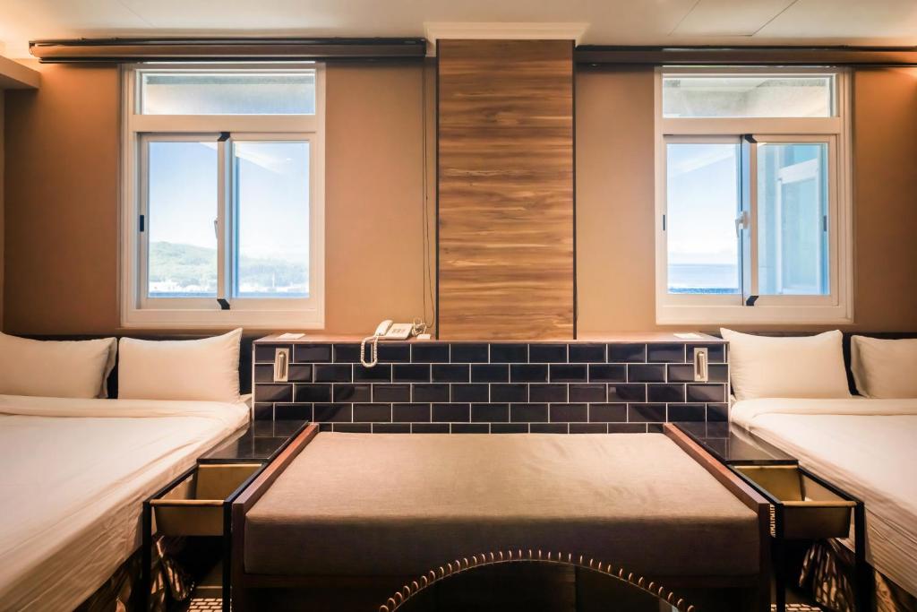 Postel nebo postele na pokoji v ubytování Zhudeng 1965 Hotel