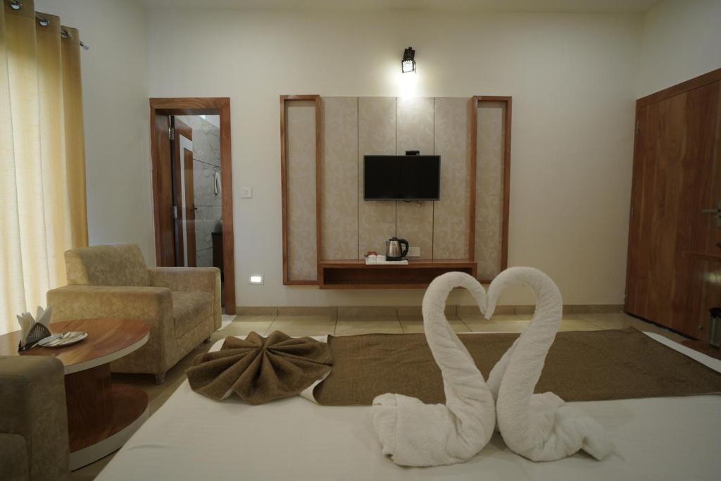 TV a/nebo společenská místnost v ubytování Amar Bagh Resort