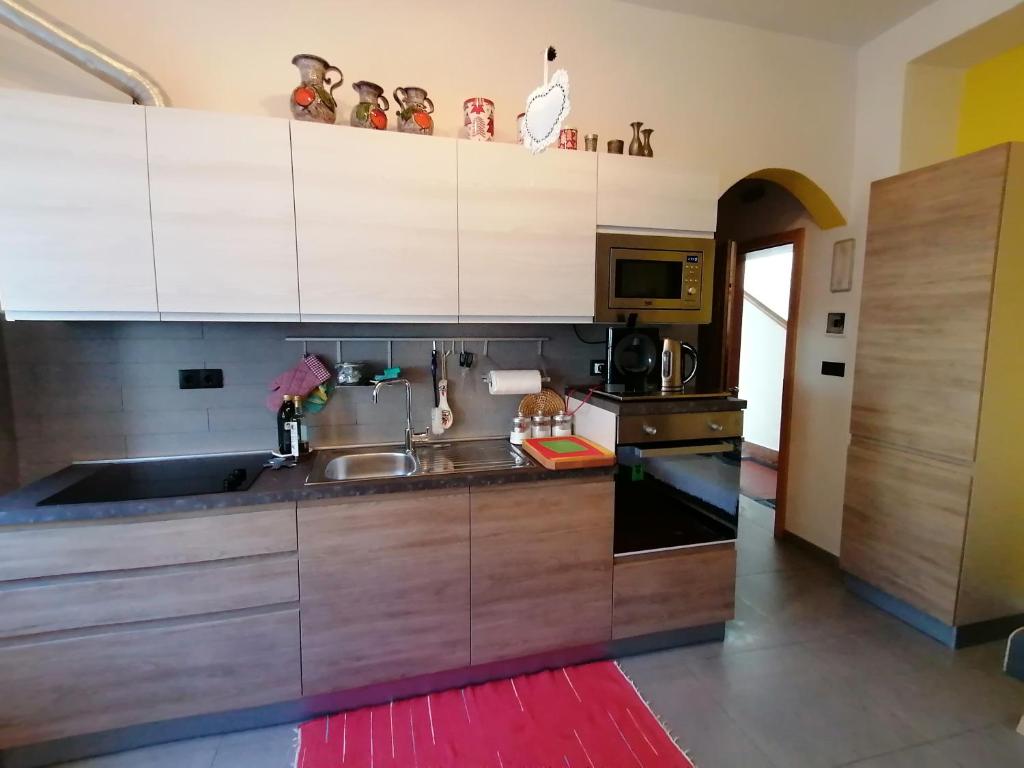 Kuchyň nebo kuchyňský kout v ubytování Villa Alessandra