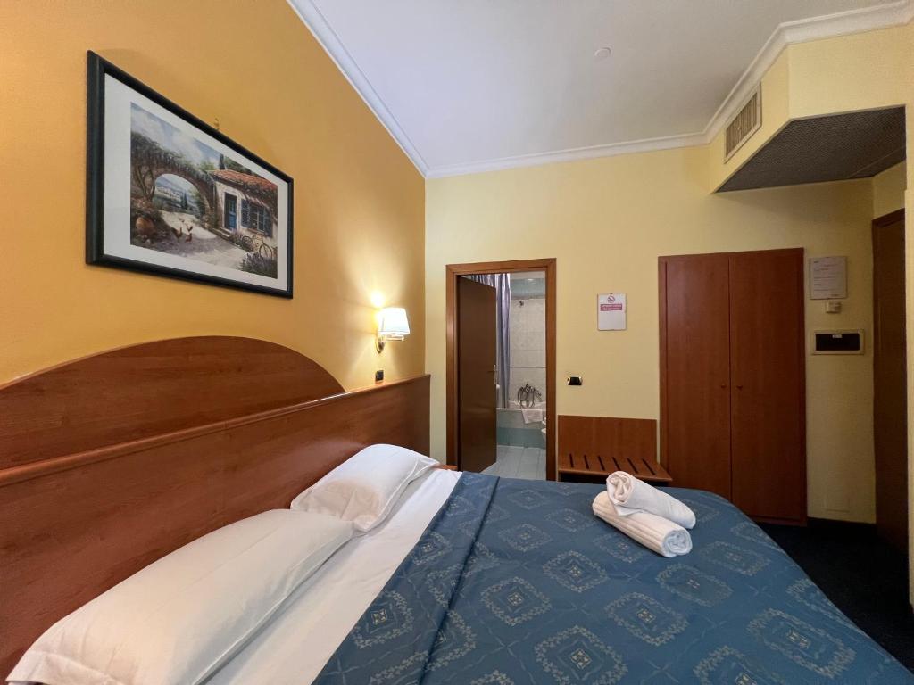 Postel nebo postele na pokoji v ubytování Baltik Guesthouse