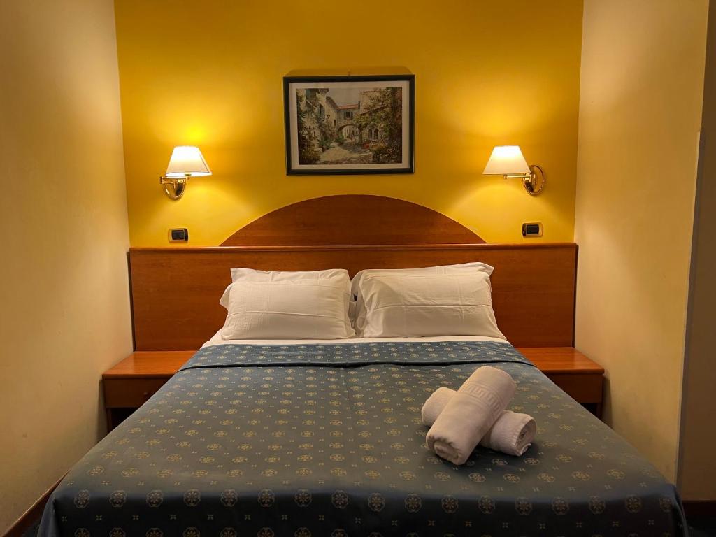 Postel nebo postele na pokoji v ubytování Baltik Guesthouse