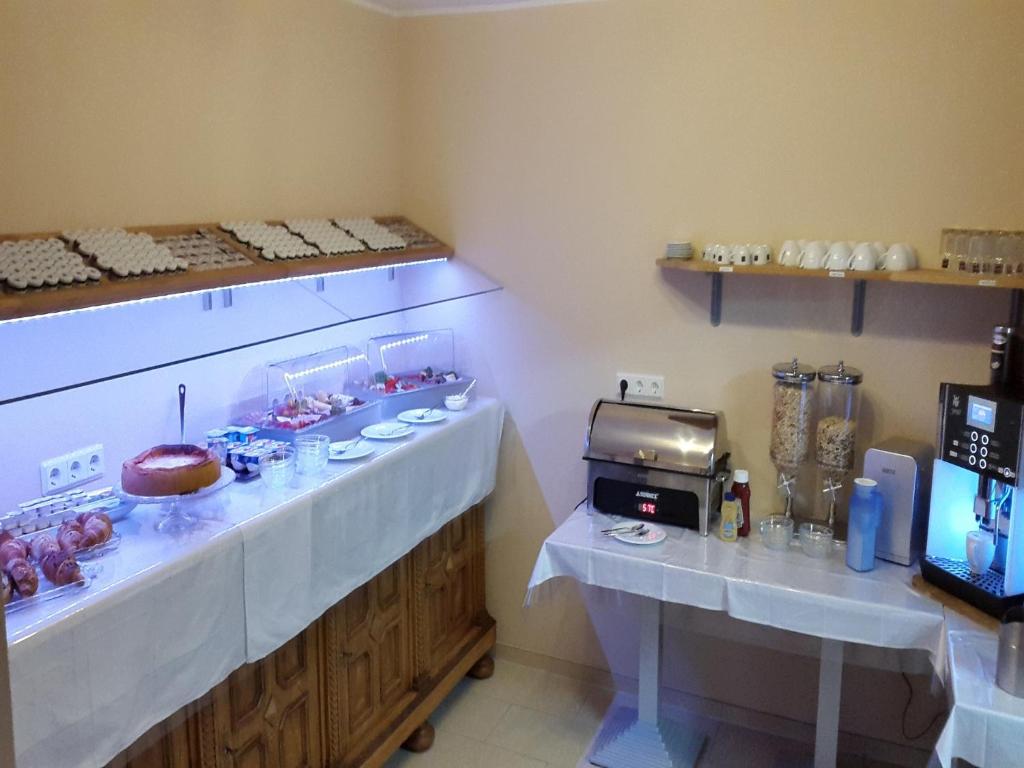 Kuchyň nebo kuchyňský kout v ubytování Apado-Hotel garni